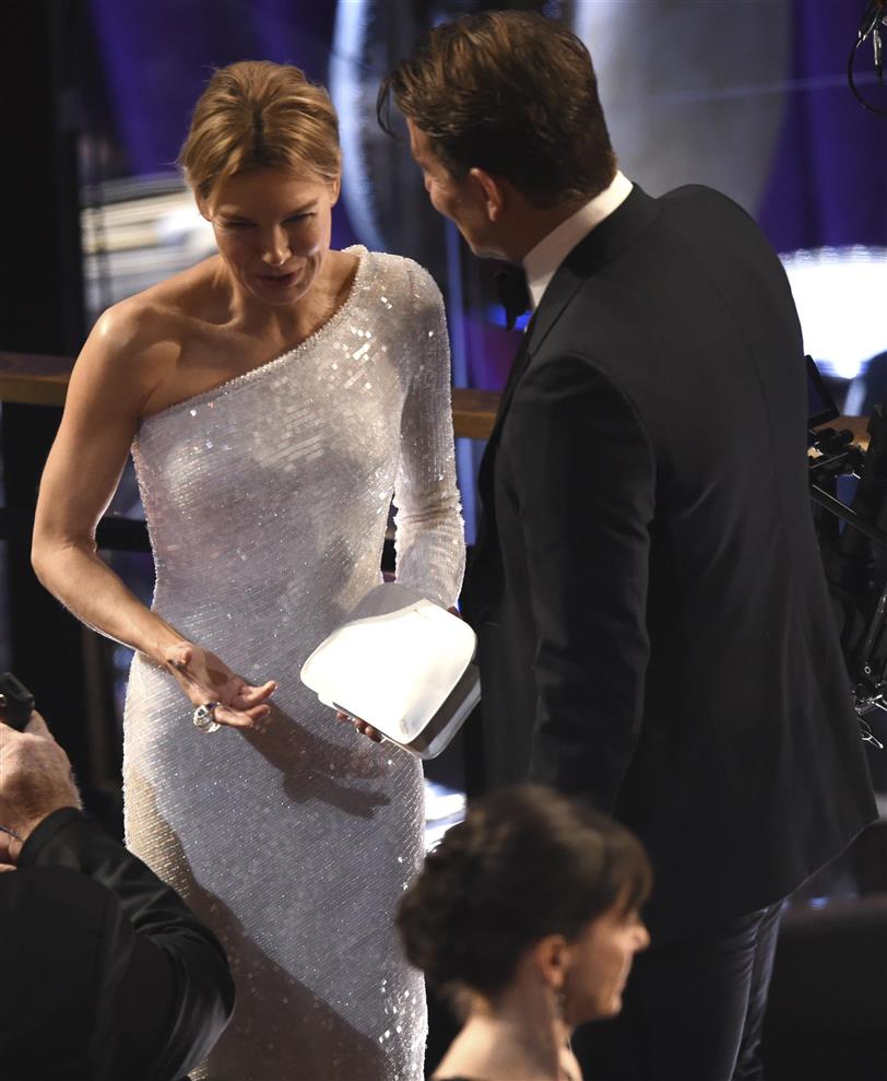 Renée Zellweger y Bradley Cooper en los Oscar