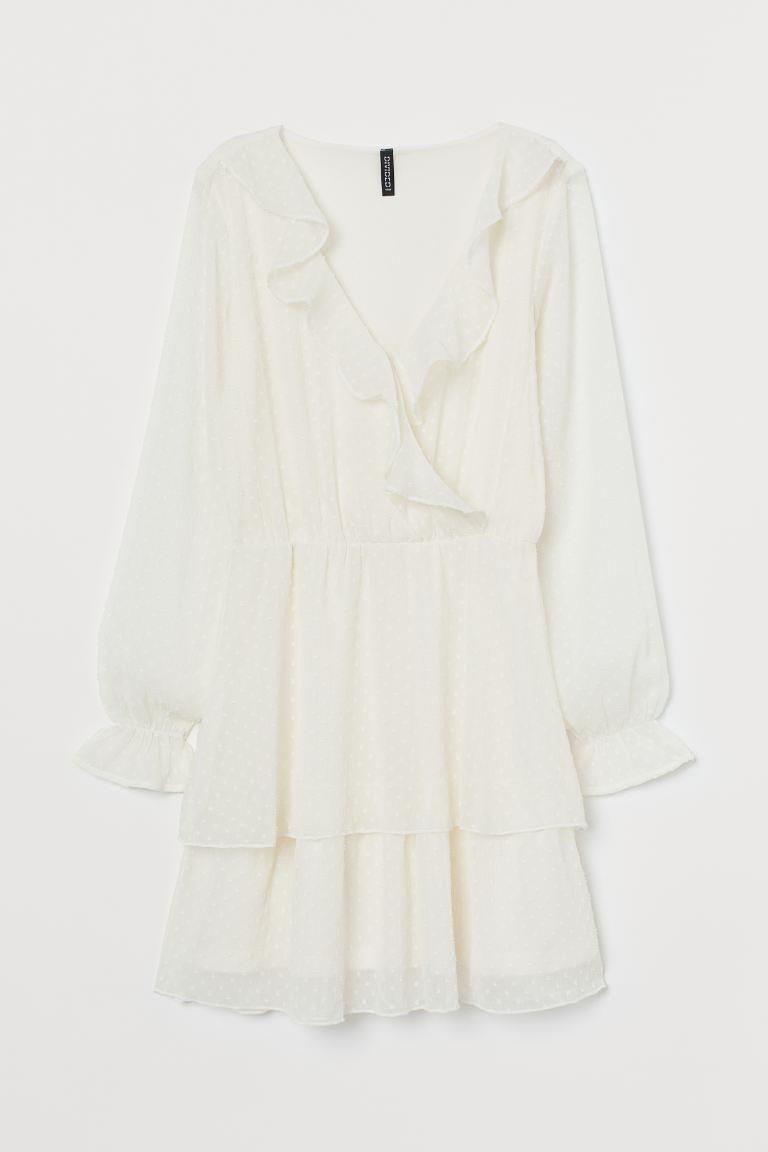 Vestido mini blanco con tejido de plumeti de H&M