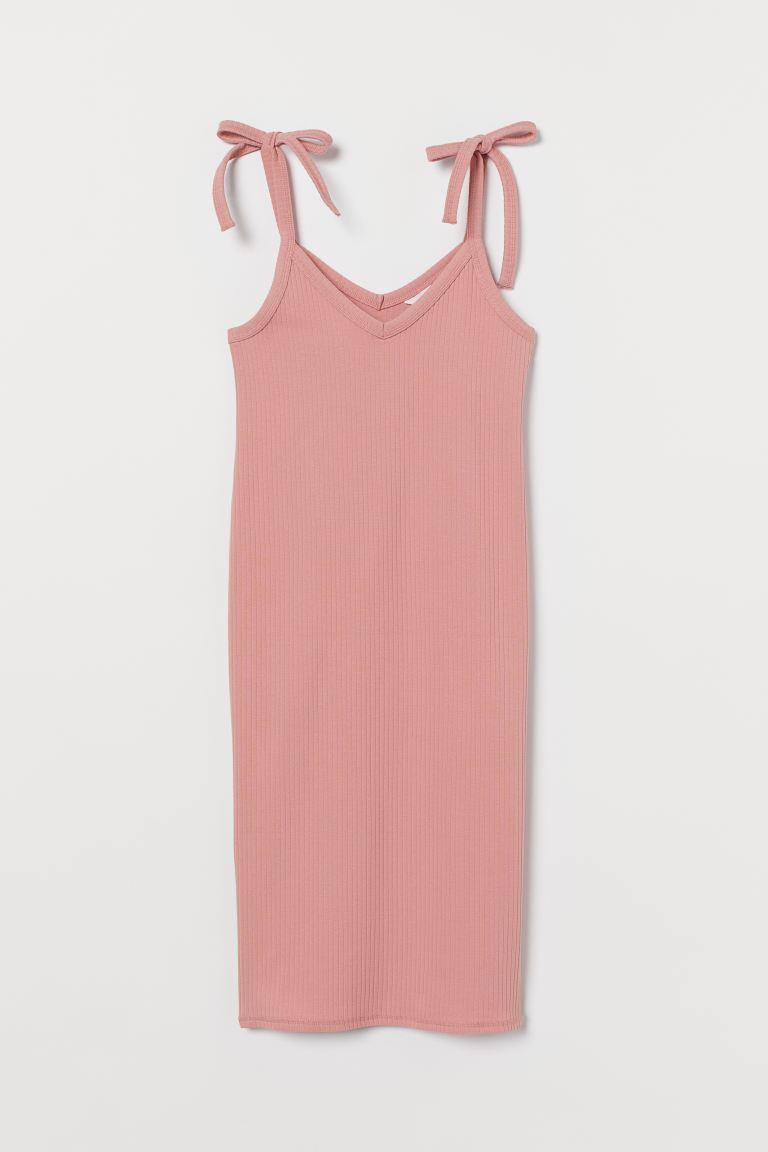 Vestido de canalé rosa con lazos, de H&M