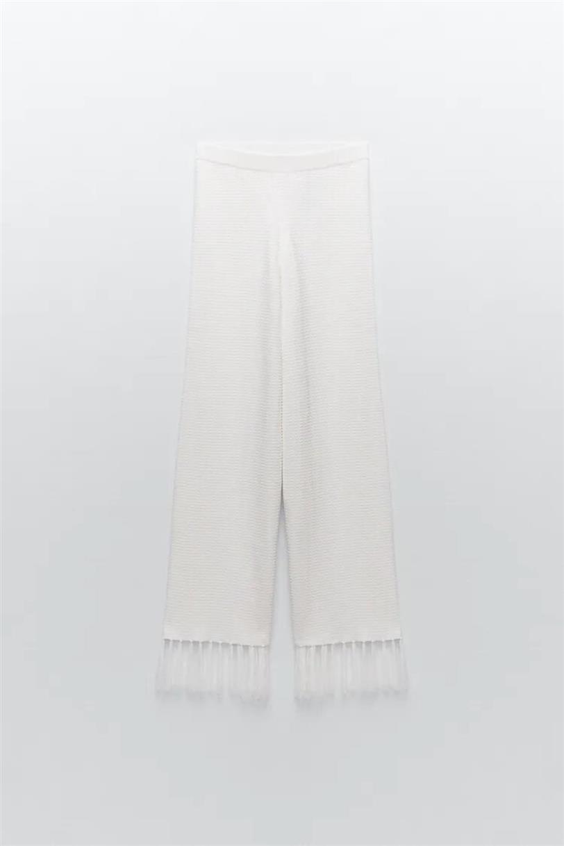 Pantalón de flecos blanco de Zara