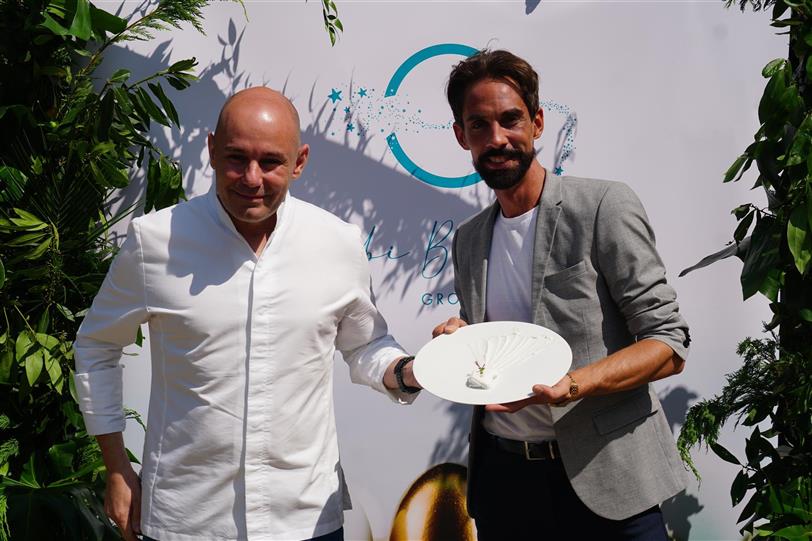 El chef cuatro estrellas Michelin Nazario Cano, del prestigioso restaurante Odiseo, y el diseñador de alta moda Eduardo Andés