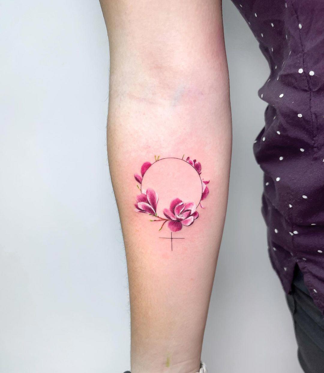 Tatuaje de símbolo feminista