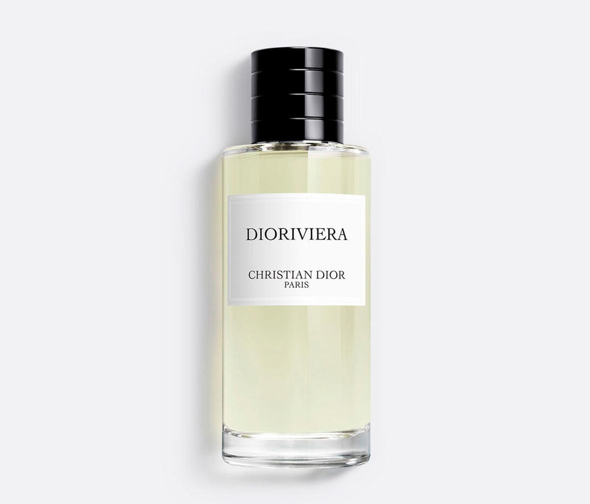 frasco de perfume con etiqueta blanca y tapón negro