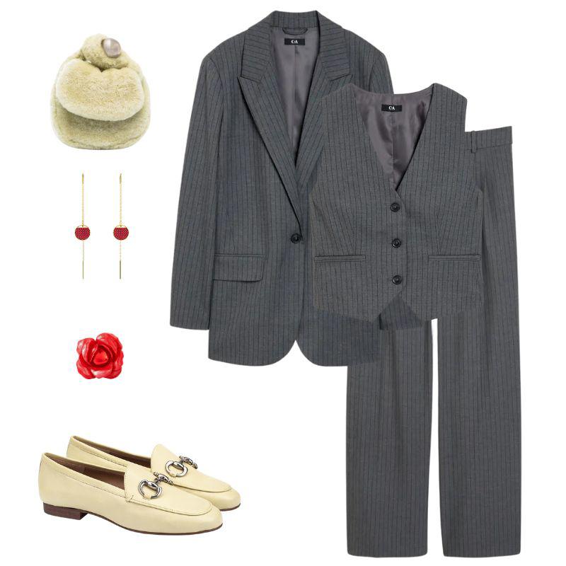 Co´mo vestir en una entrevista de trabajo: con un traje gris y complementos de color